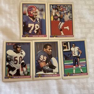 10 NFL Trading cards featuring Jerry Rice, Bruce Smith, Barry Sanders and more.